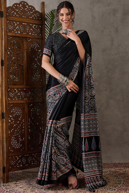 Prettiest Black Ajrakh Printed Semi Modal Silk Saree With Allure Blouse Piece