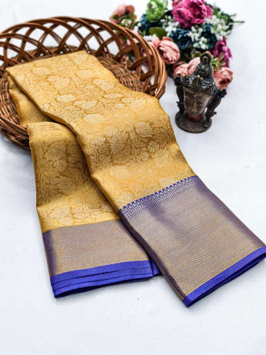 Ravishing Golden Soft Tissue Silk Saree With Delightful Blouse Piece