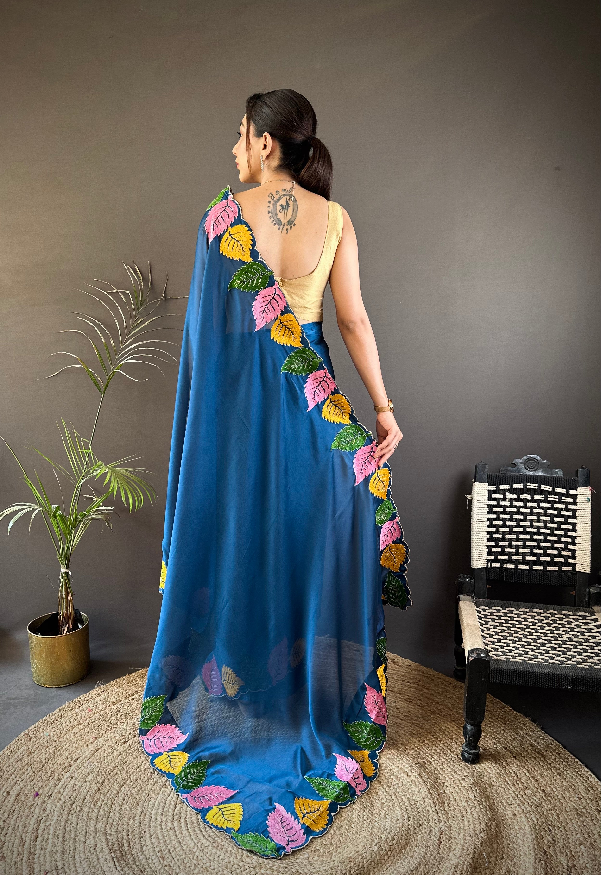 Navy Blue Georgette Saree with Multicolor Leaf Embroidery Border & Designer Pallu
