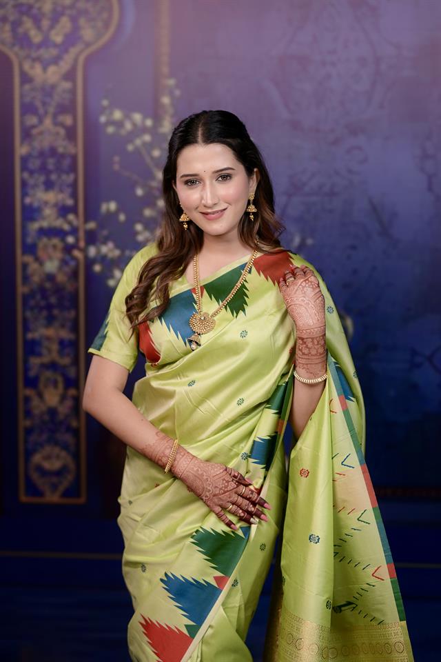 Parrot Green Banarasi Silk Saree with Multicolor Ikat Design & Rich Zari Woven Pallu