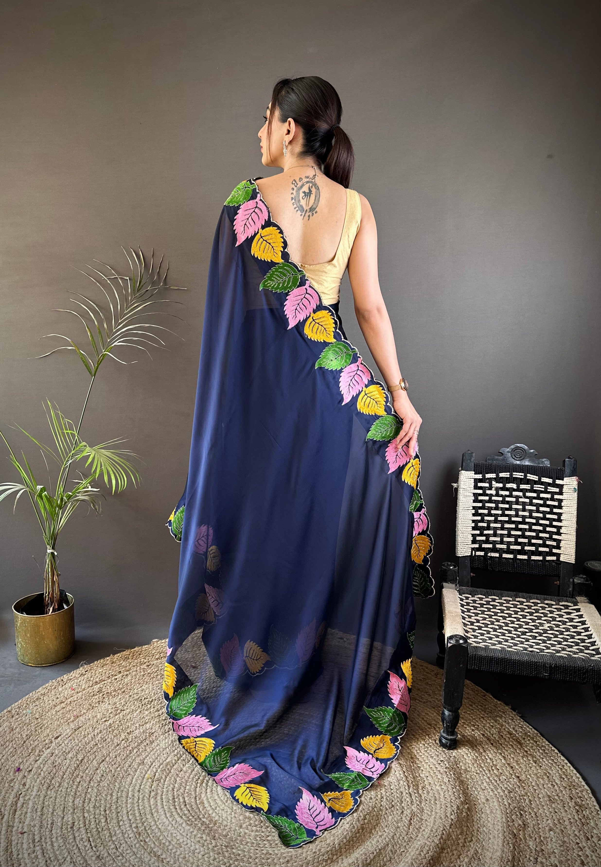 Navy Blue Georgette Saree with Multicolor Leaf Embroidery Border & Designer Pallu