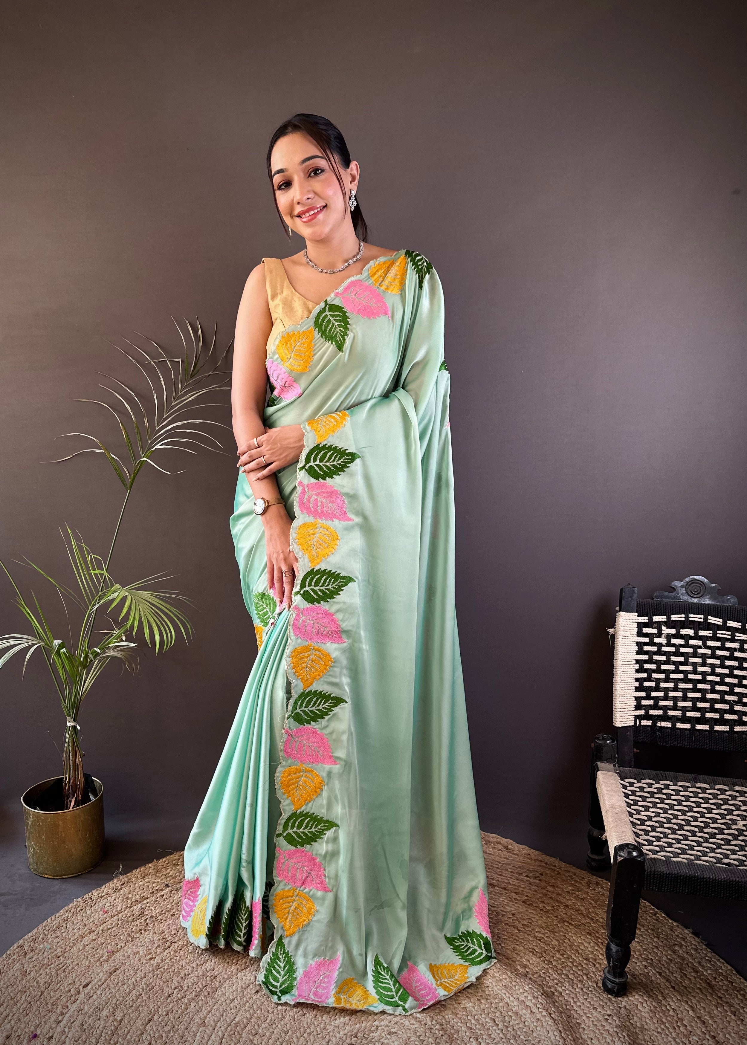 Mint Green Georgette Saree with Multicolor Leaf Embroidery Border & Designer Pallu