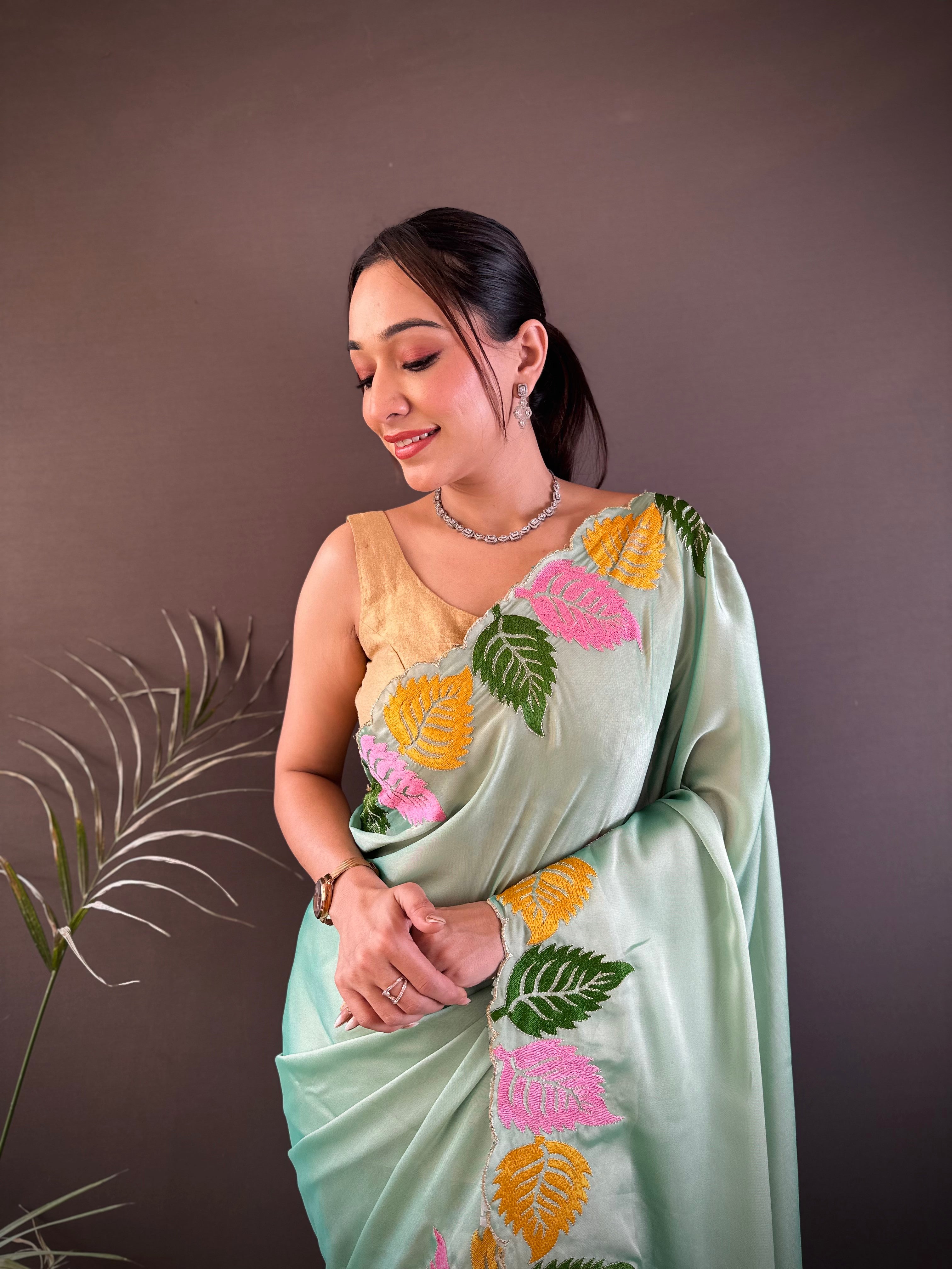 Mint Green Georgette Saree with Multicolor Leaf Embroidery Border & Designer Pallu