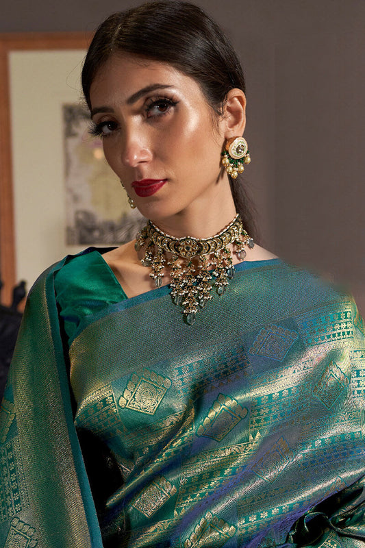 Innovative Rama Kanjivaram Silk Saree With Adorning Blouse Piece