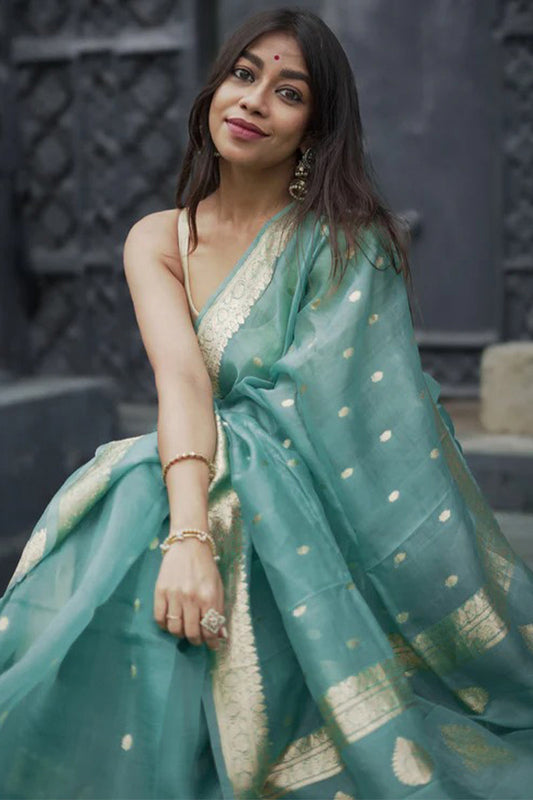 Moiety Turquoise Banarasi Silk Saree With Panoply Blouse Piece