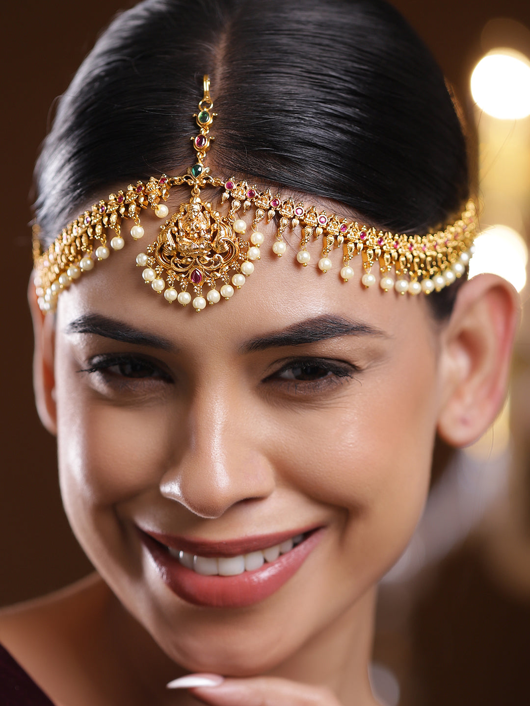 Wentra 22K Gold-Plated Lakshmi Motif Ruby Red & Emerald Green Stone & Pearl Beaded Traditional Bridal Matha Patti