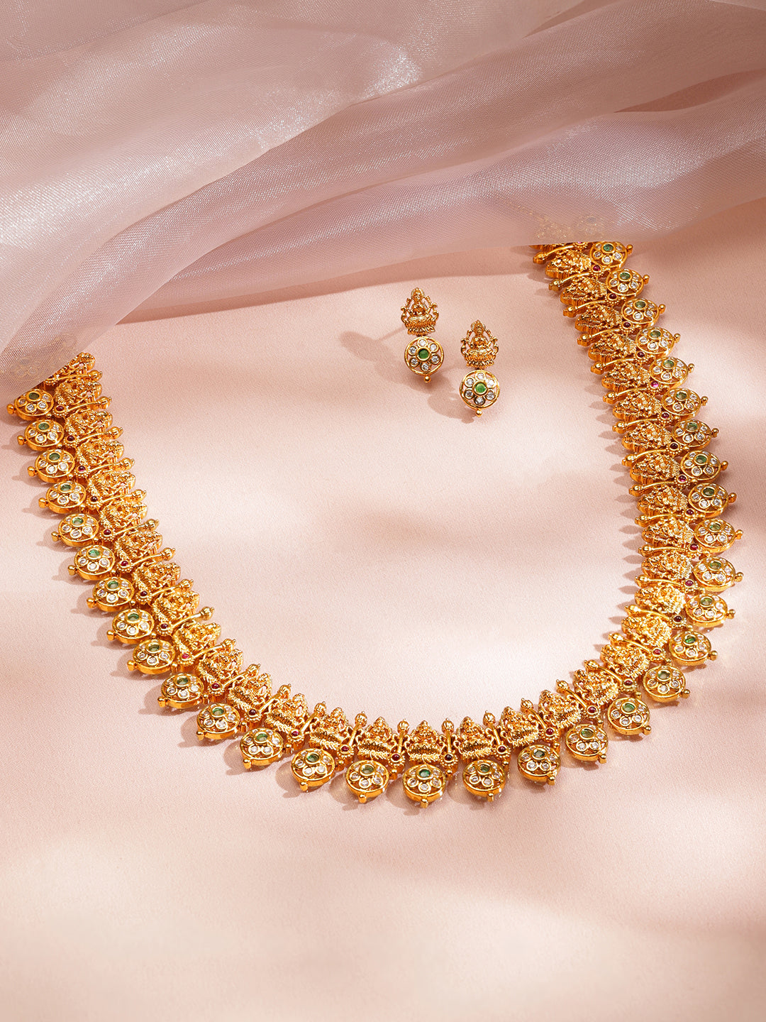 White Studded Laxmi Motif Gold Necklace Set
