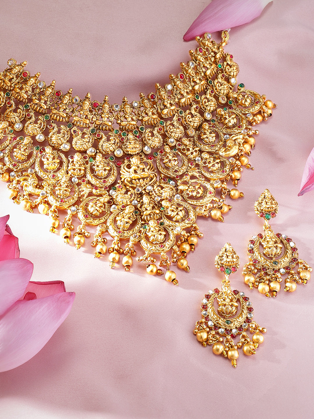 Wentra 22K Gold Plated Red, Green & White Stone Studded Lakshmi Motif Temple Jewellery Set