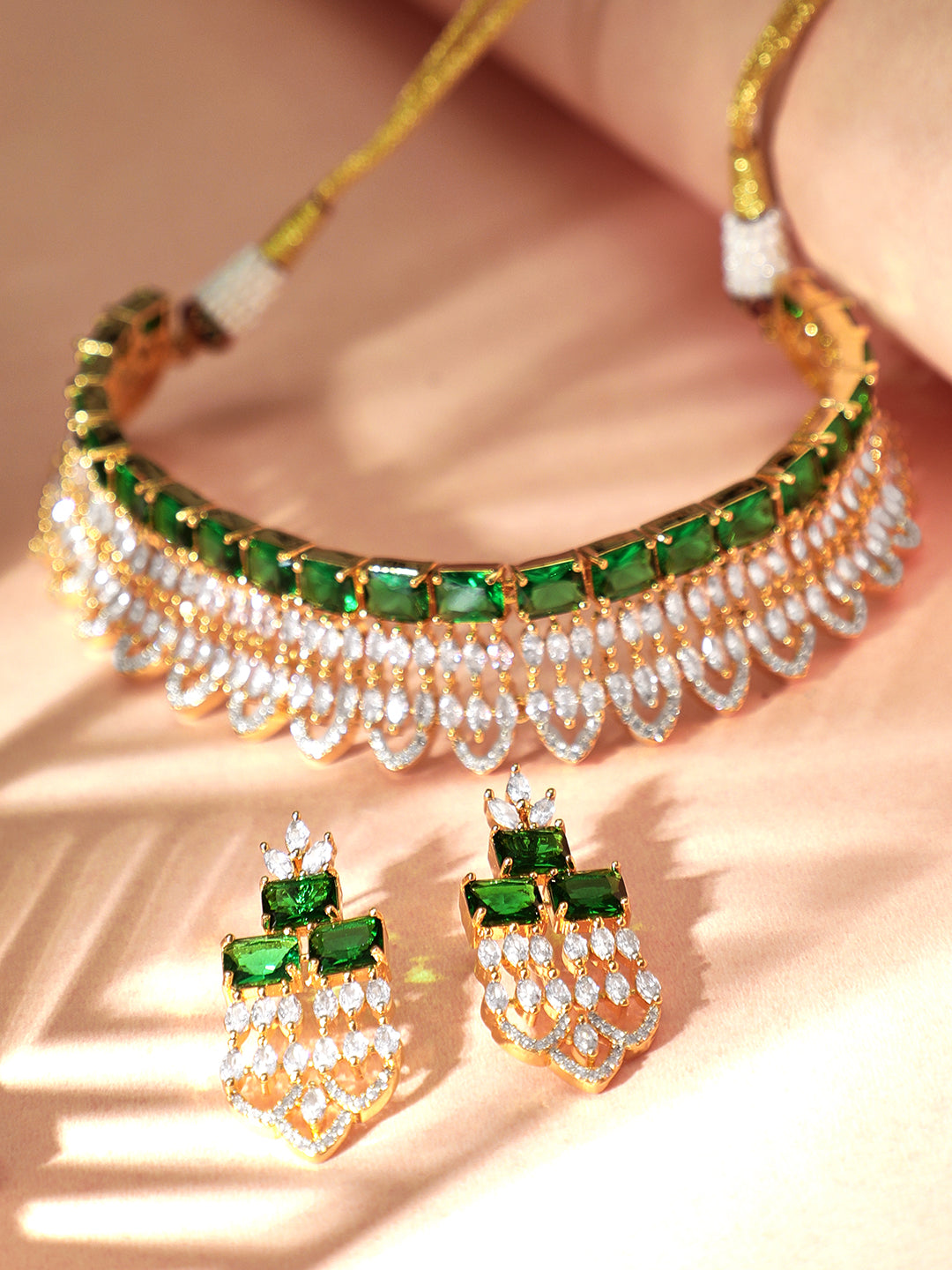 Wentra Gold Plated Green & White Stone Studded American Diamond Necklace Set.