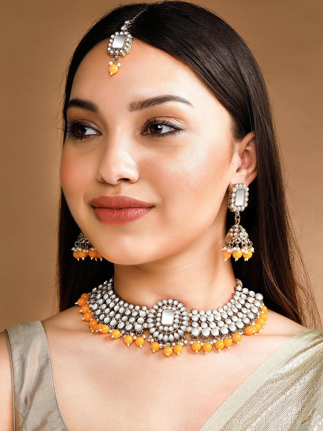 Wentra Gold Plated Mirror Studded Yellow Beads Necklace Set.
