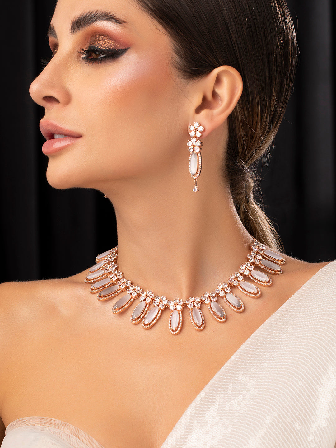 Wentra Rose Gold Plated White Beads American Diamond Necklace Set.