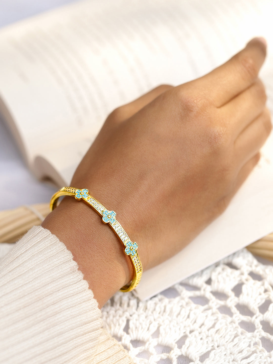 White And Blue Studded Floral Golden Bracelet