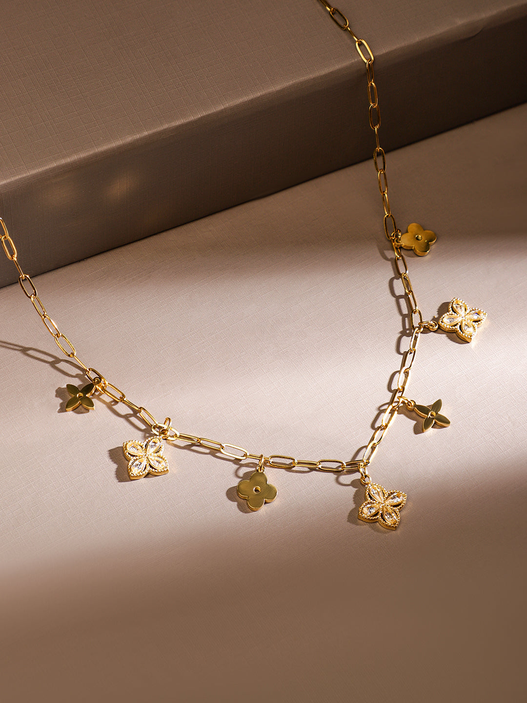 Gold Toned Floral Charms Paperclip Necklace
