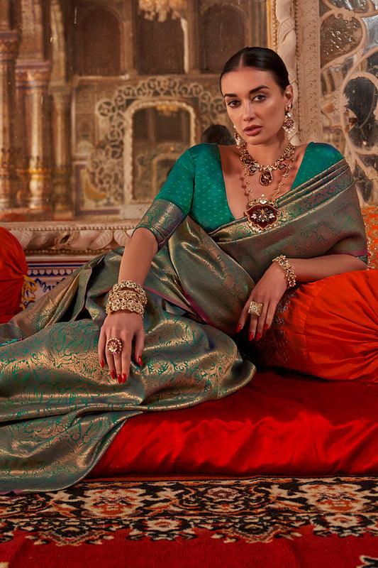 Staring Rama Kanjivaram Silk Saree With Divine Blouse Piece
