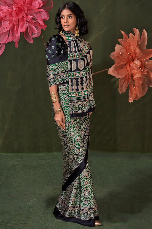 Glamorous Green Ajrakh Printed Satin Silk Saree With Cynosure Blouse Piece