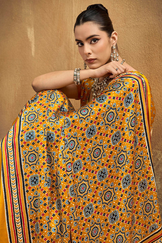Scintillating Mustard Ajrakh Printed Semi Modal Silk Saree With Arresting Blouse Piece