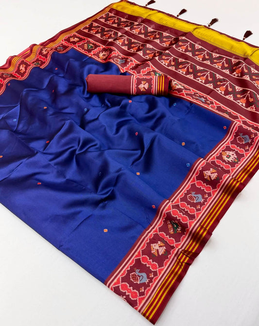 Vestigial Royal Blue Printed Patola Handloom Silk Saree With Angelic Blouse Piece
