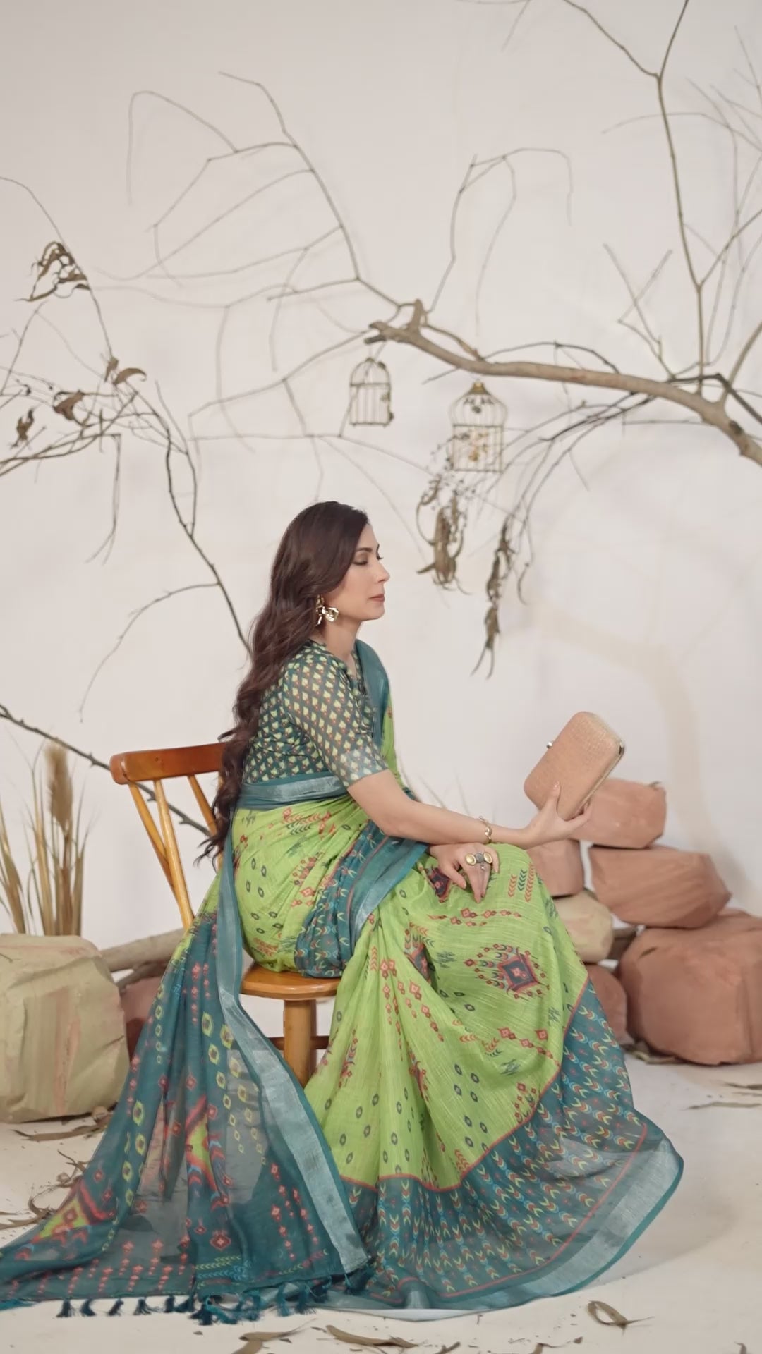 Women's Premium Linen Silk Ikat Printed Saree with Emerald Green Woven Border & Designer Tassel Pallu