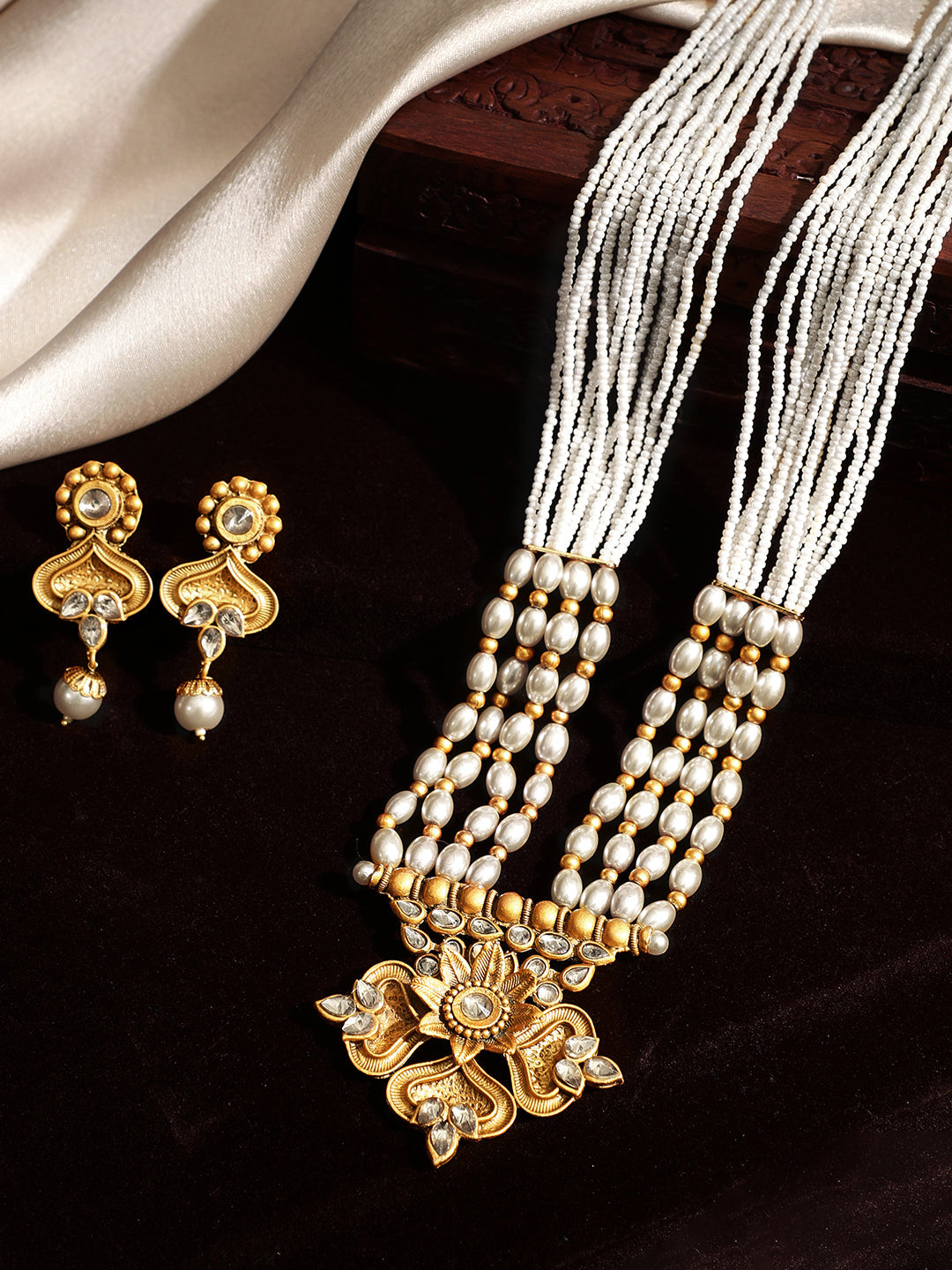 Wentra Gold Plated Handcrafted Kundan & white Beads Necklace Set