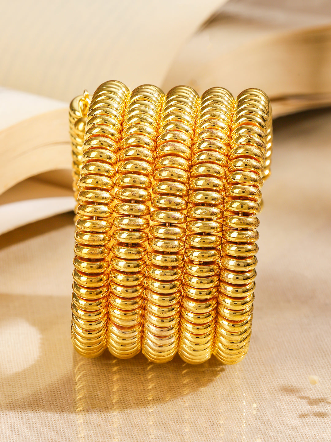Glossy Golden Beaded Coiled Bracelet