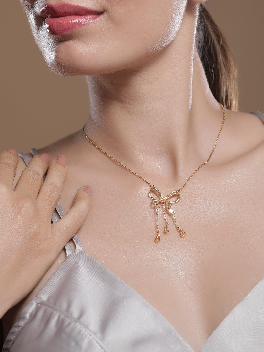 Ribbon Motif Gold Pendant Necklace