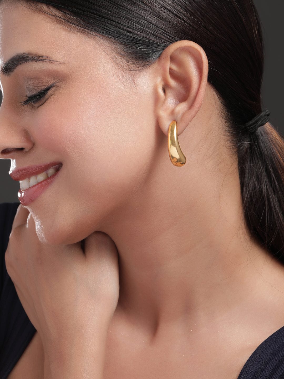 Curved Elegance in Gold Hoops