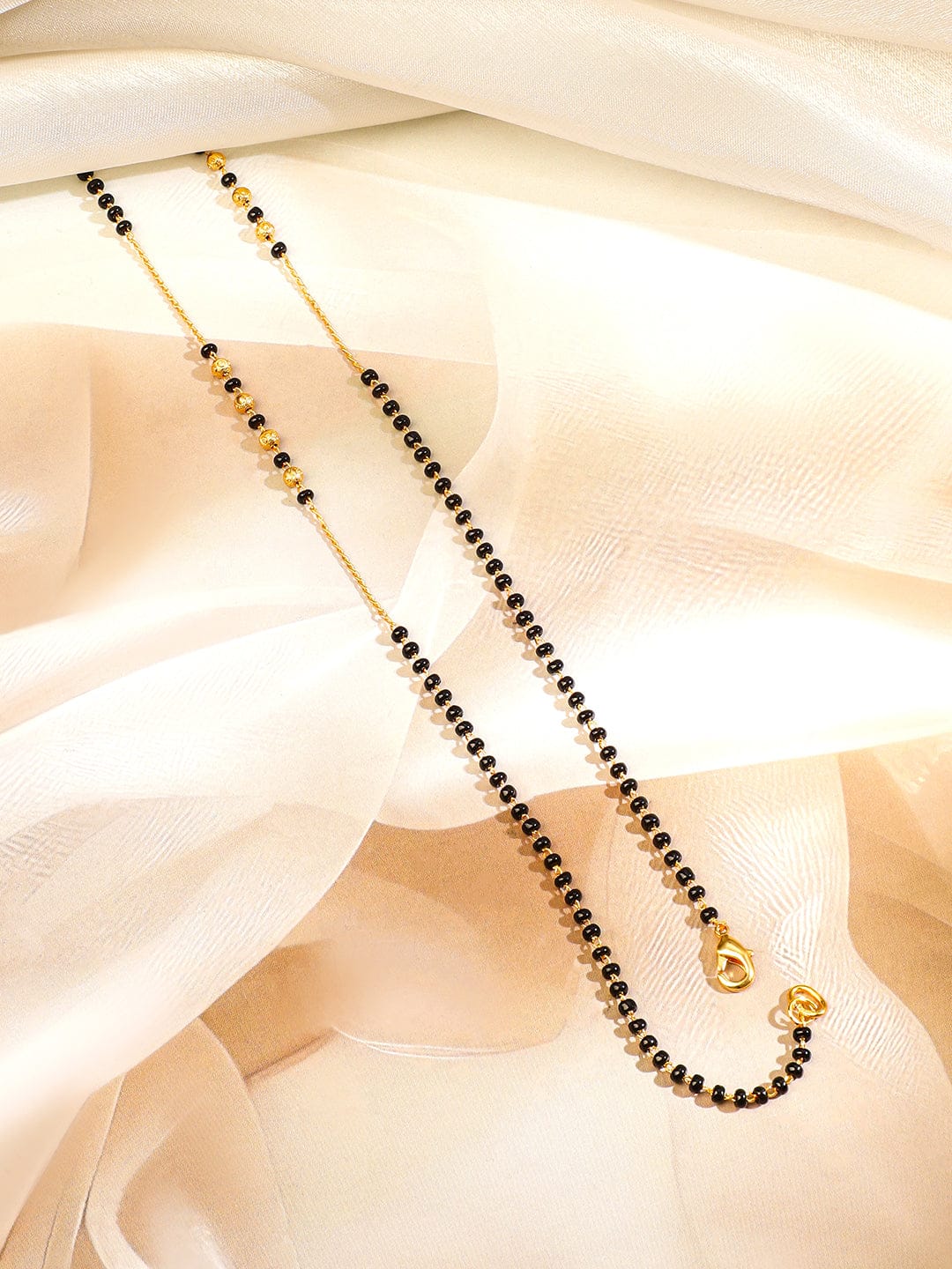 Wentra 18K Gold-Plated White Cubic Zirconia Studded Floral & Teardrop Pendant Mangalsutra with Black & Gold Beaded Chain