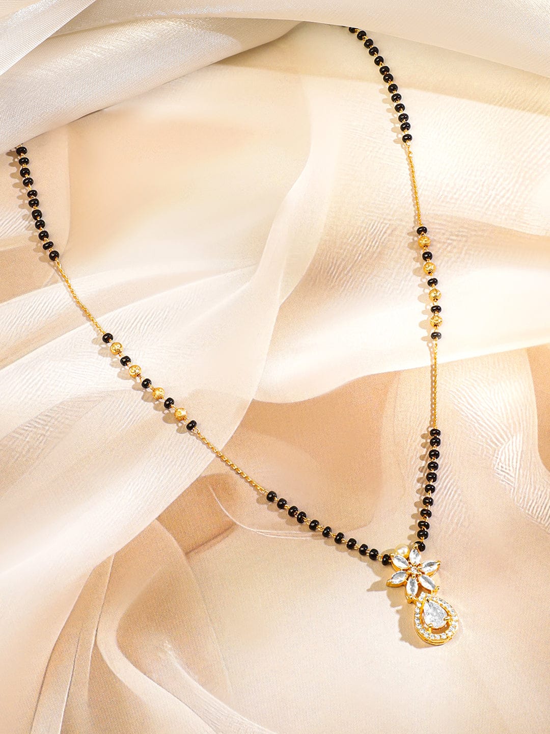 Wentra 18K Gold-Plated White Cubic Zirconia Studded Floral & Teardrop Pendant Mangalsutra with Black & Gold Beaded Chain