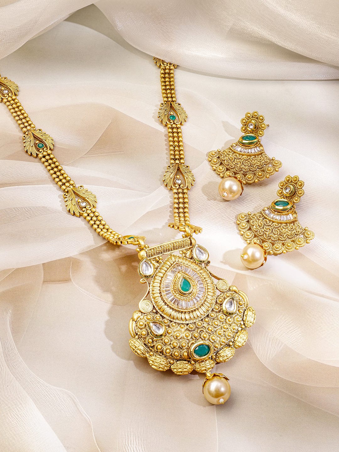 Emerald Studded Golden Necklace Set