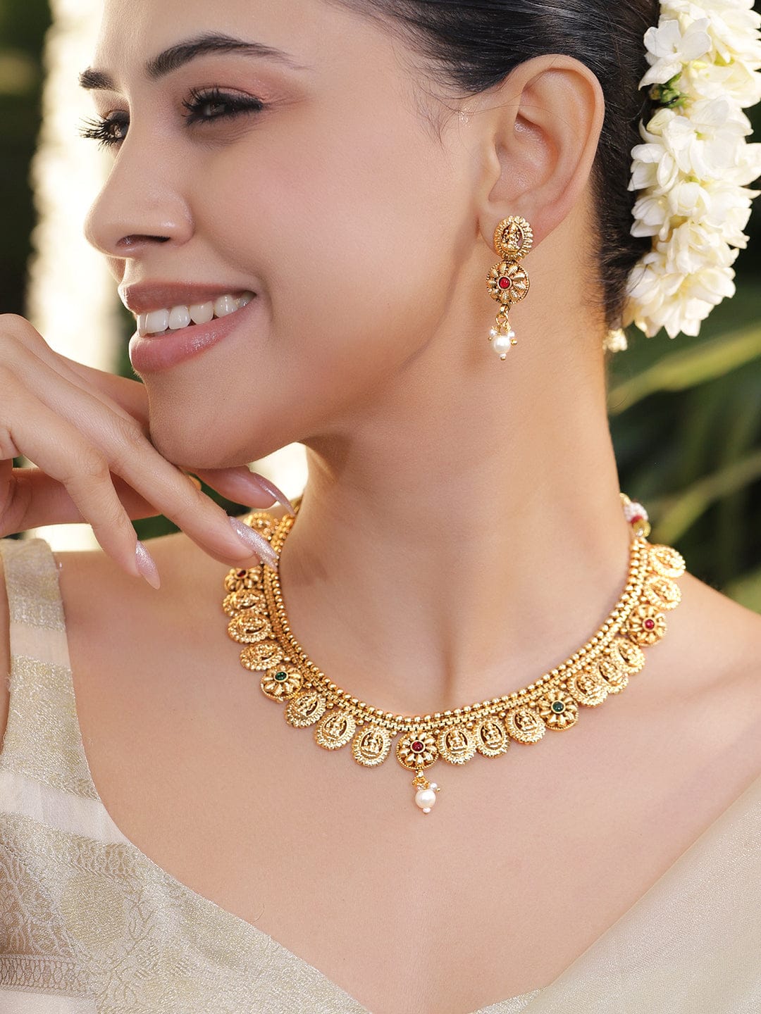 Golden Lakshmi Motif Studded Jewellery Set