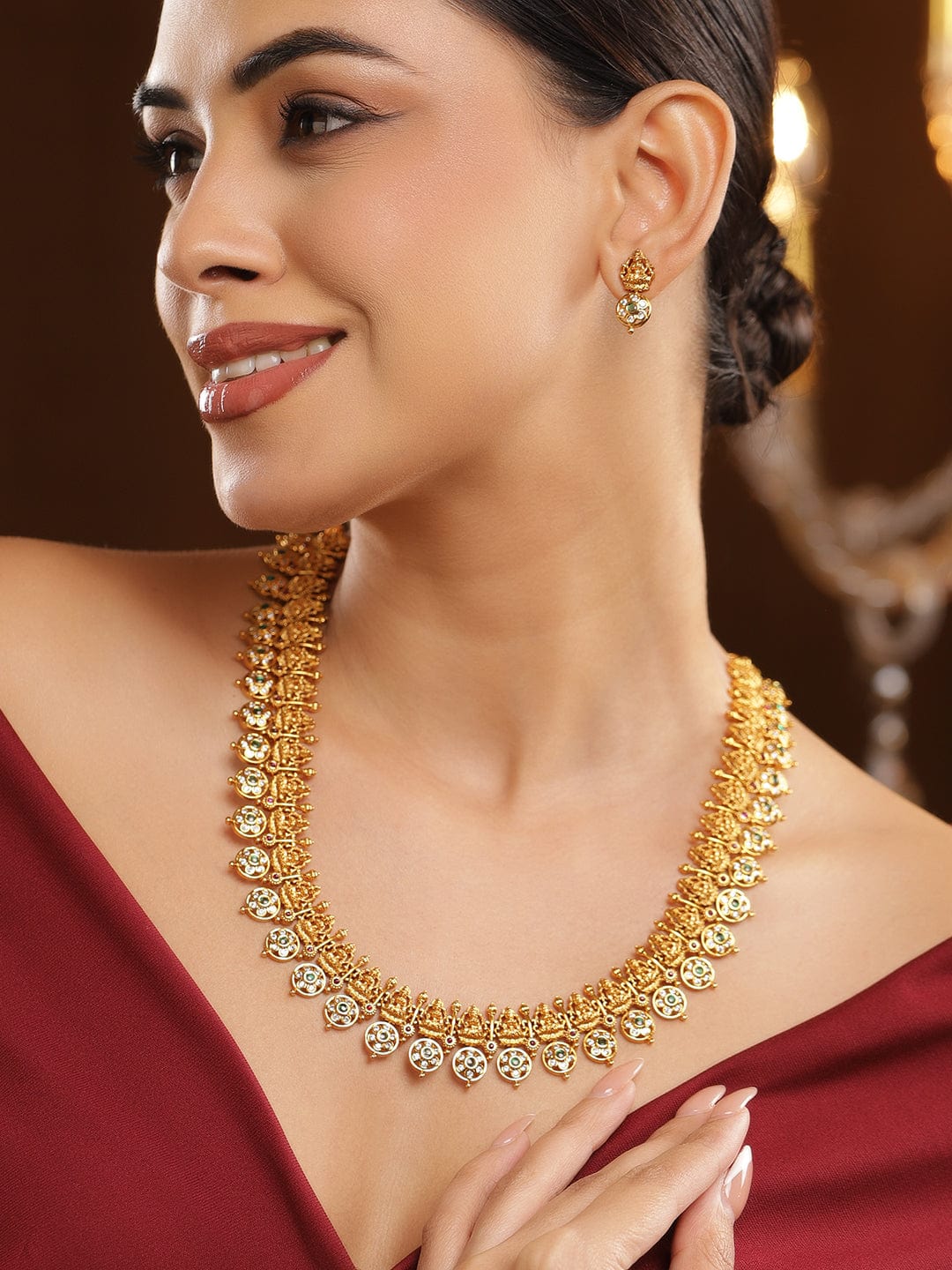 White Studded Laxmi Motif Gold Necklace Set
