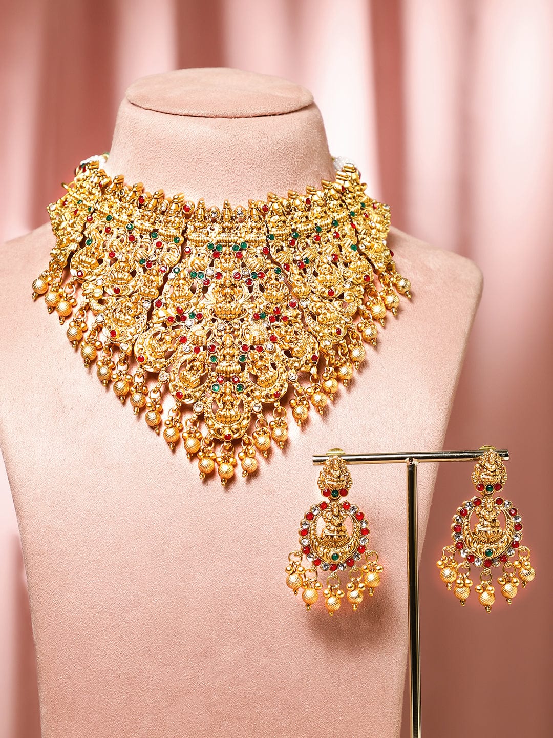 Wentra 22K Gold Plated Red, Green & White Stone Studded Lakshmi Motif Temple Jewellery Set