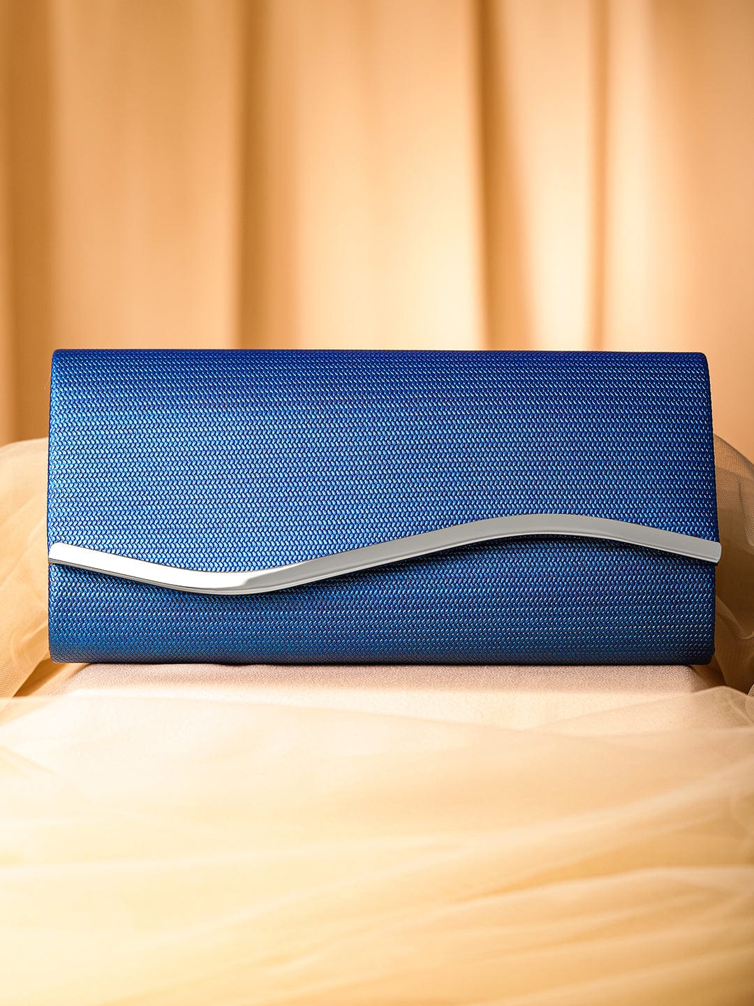 Wentra Blue Sapphire Glossy Textured Clutch with Silver-Tone Wavy Accent & Chain