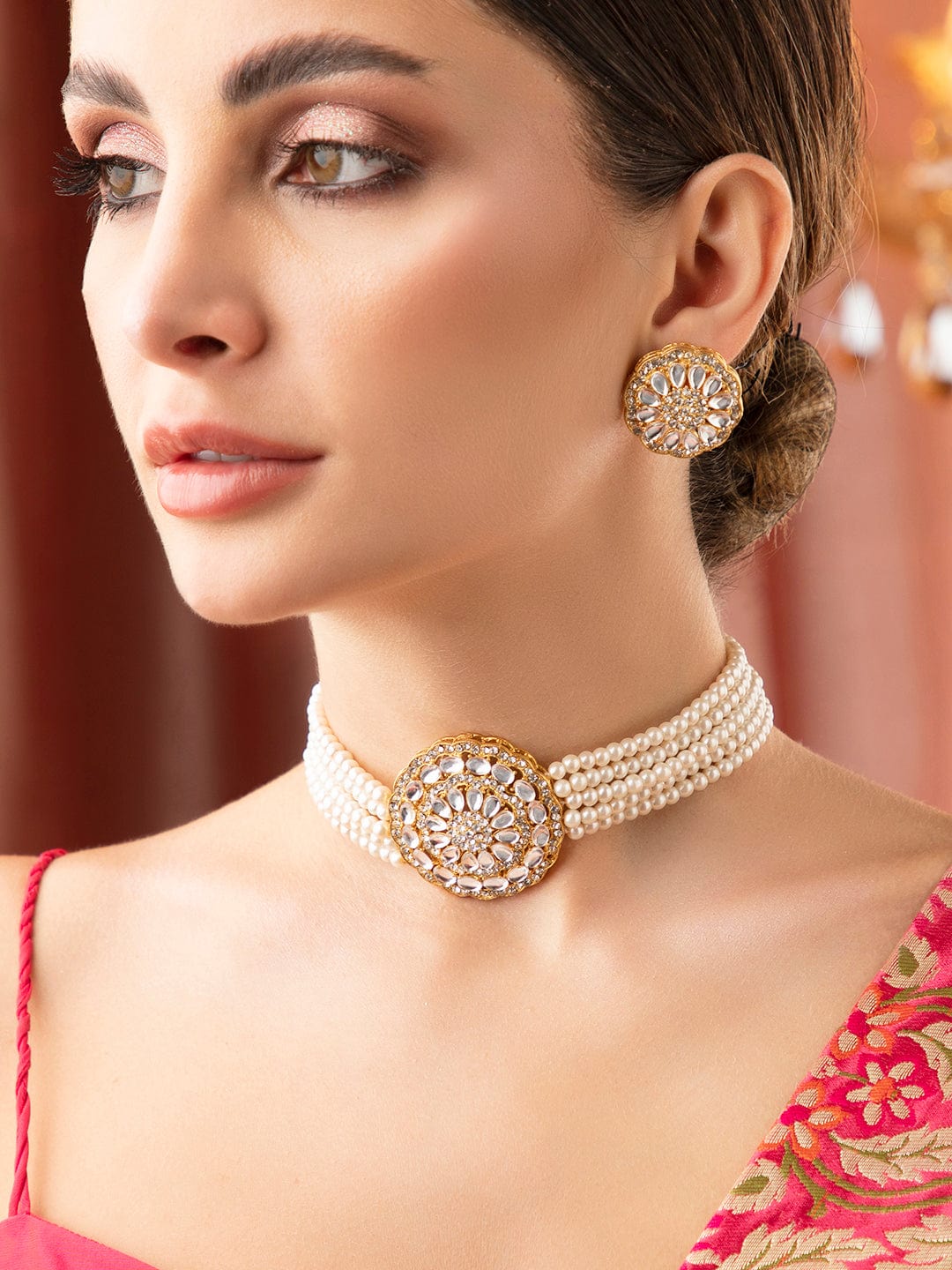 Wentra Gold Plated Elegant Kundan Choker Set With White Beads.