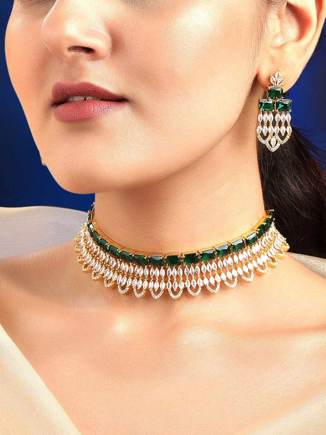 Wentra Gold Plated Green & White Stone Studded American Diamond Necklace Set.