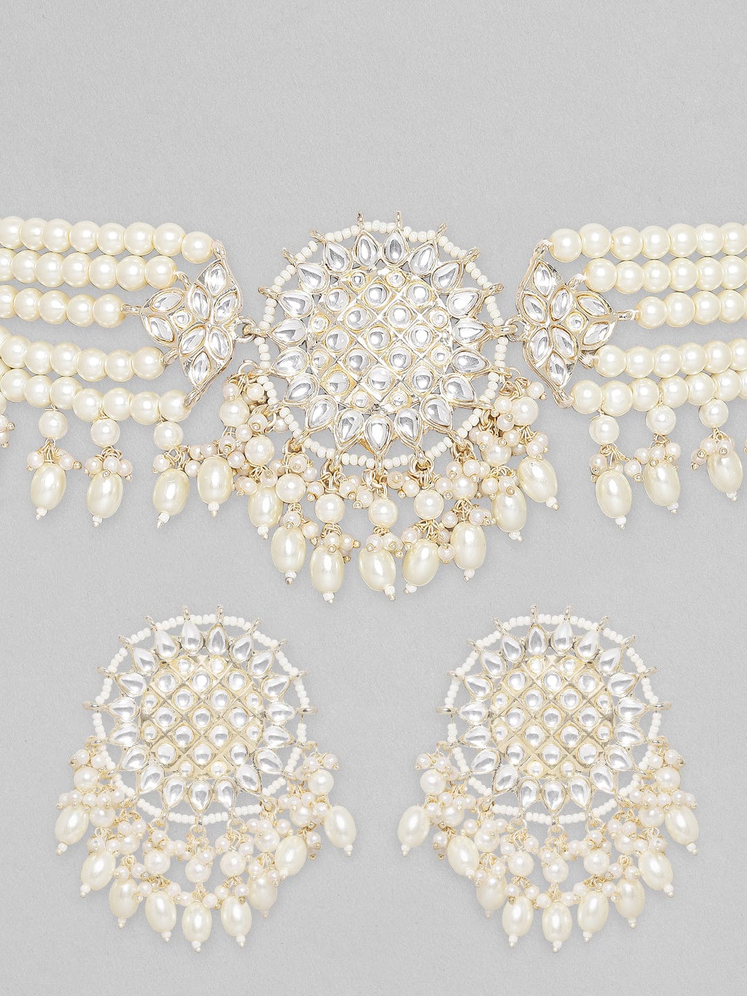 Wentra Gold Toned Kundan Studded Choker Set With Pearl Hangings.