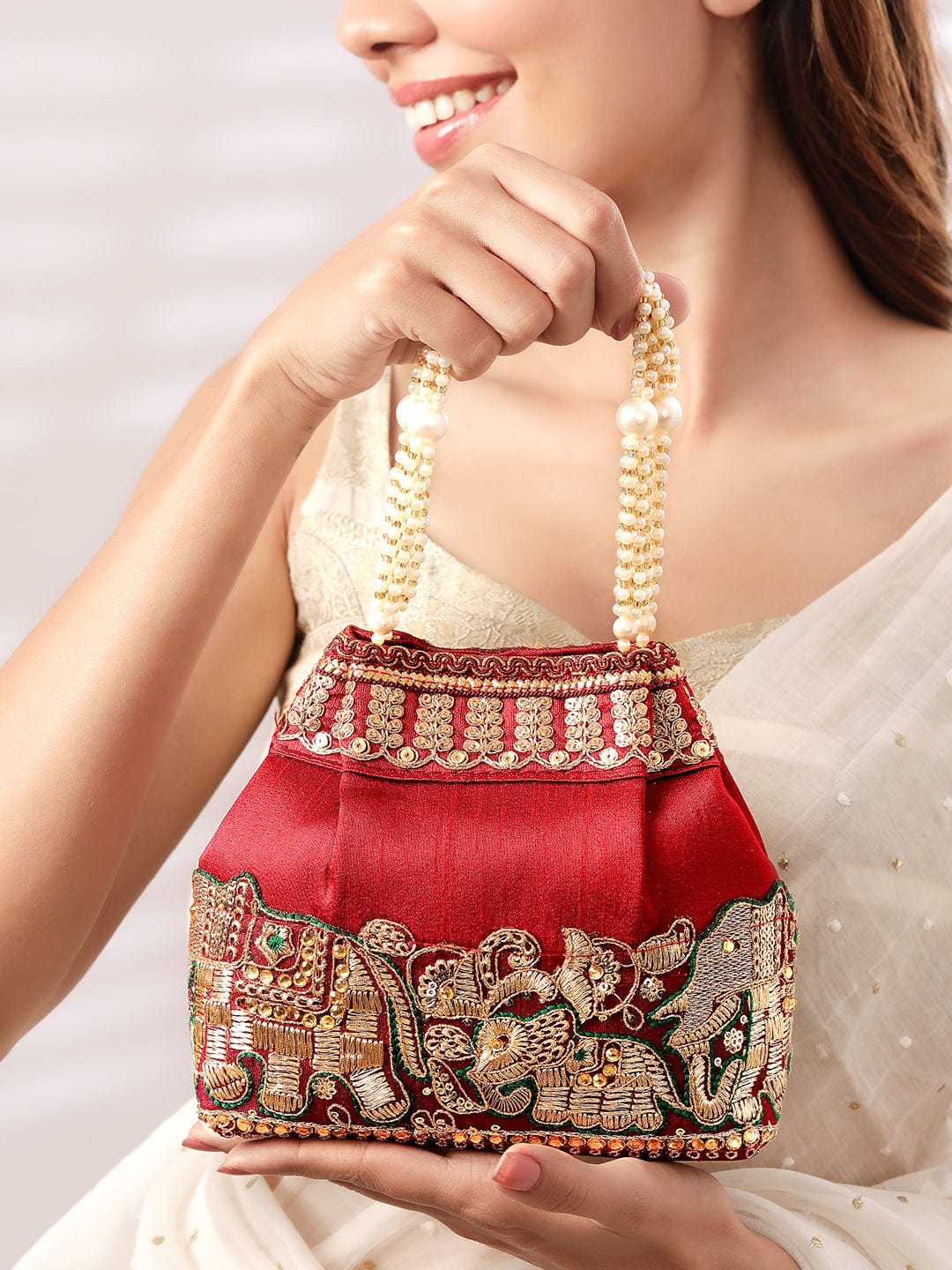 Wentra Maroon Coloured Potli Handbag With Silver Embroidery And Pearls