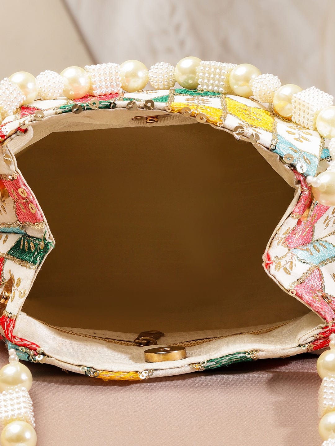 Wentra Multicolour Embroidered Potli Bag with Pearl Beaded Handle on Cream Base