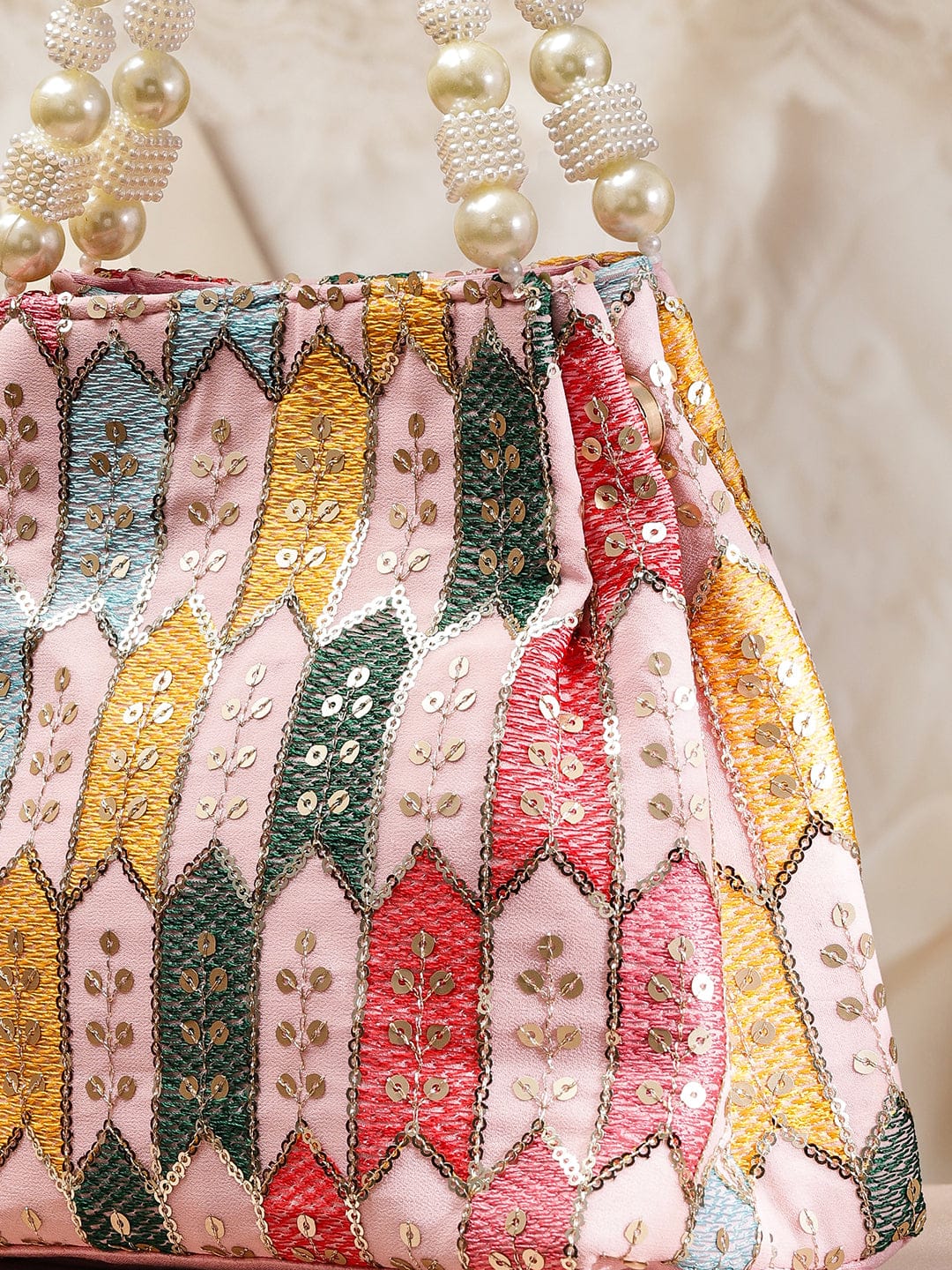 Wentra Multicolour Embroidered Potli Bag with Pearl Beaded Handle on Light Pink Base