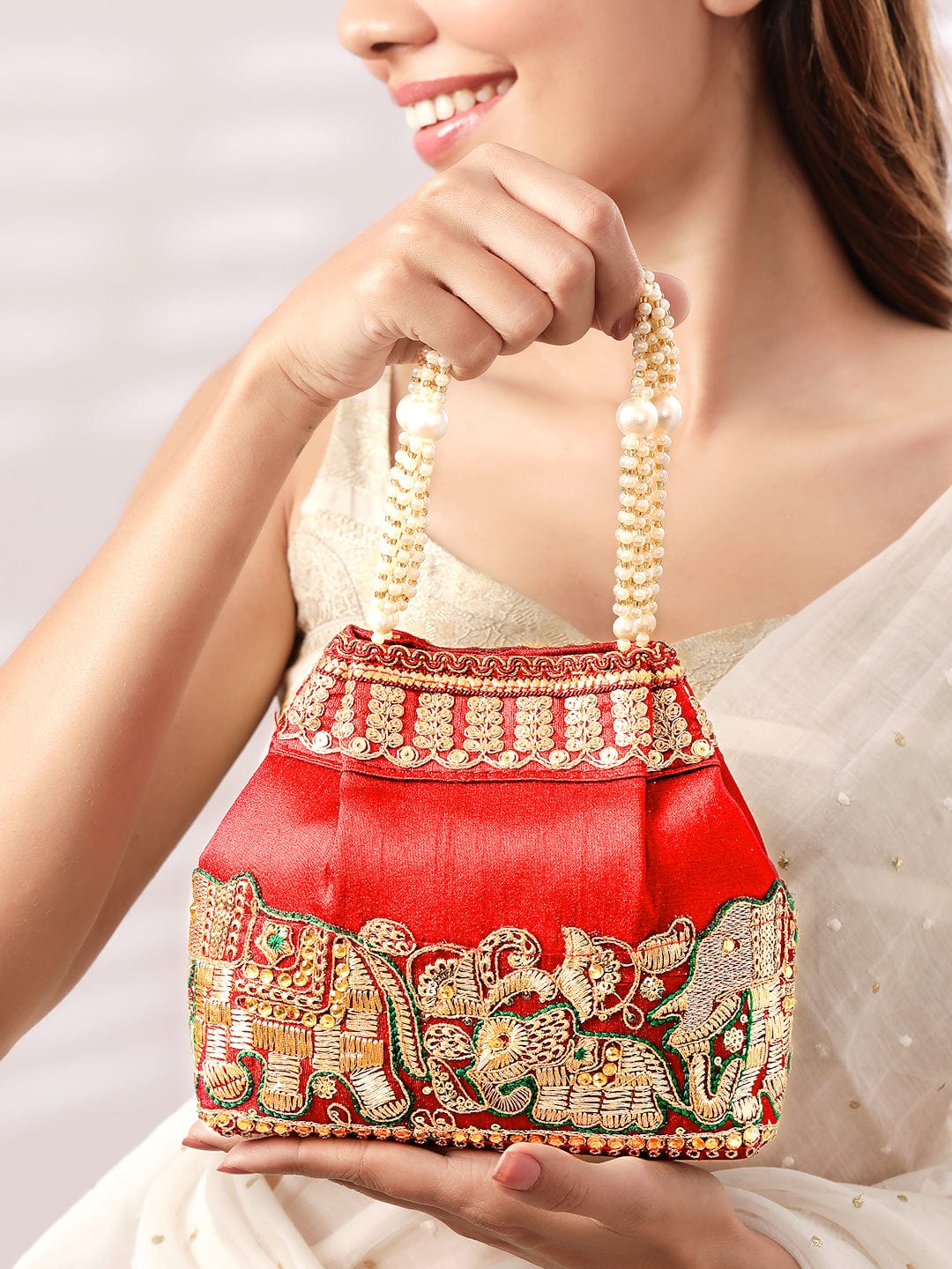 Wentra Red Embroidered & Green Border Potli Bag with Pearl Handle & Elephant Motif Details