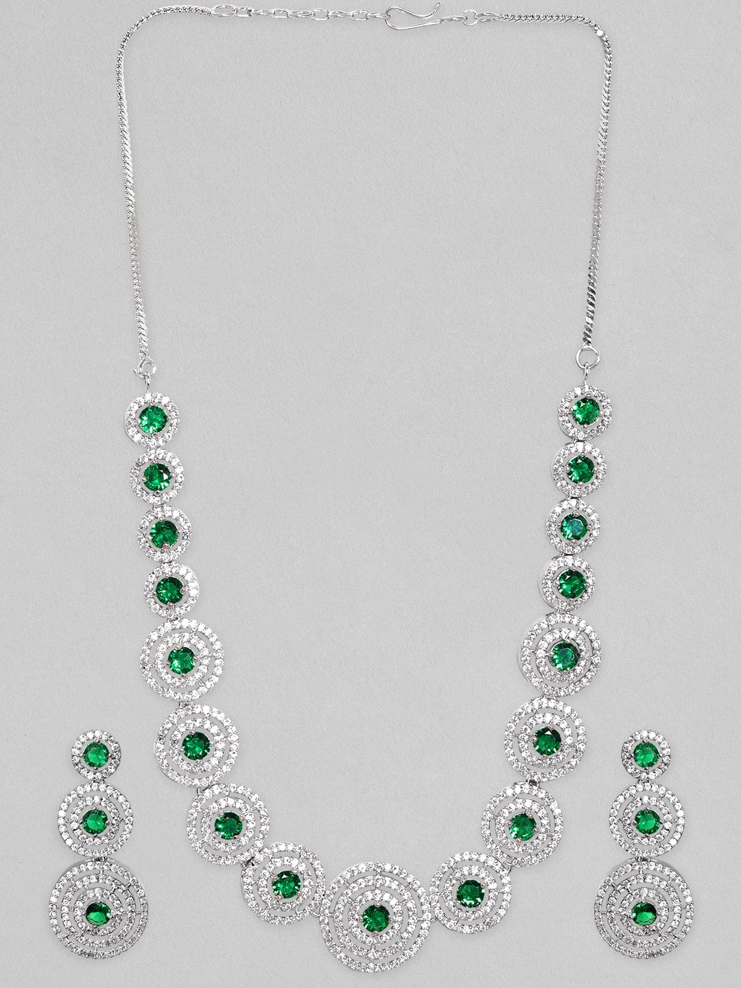 Wentra Rhodium Plated Emerald Green Zircons Studded Jewellery Set