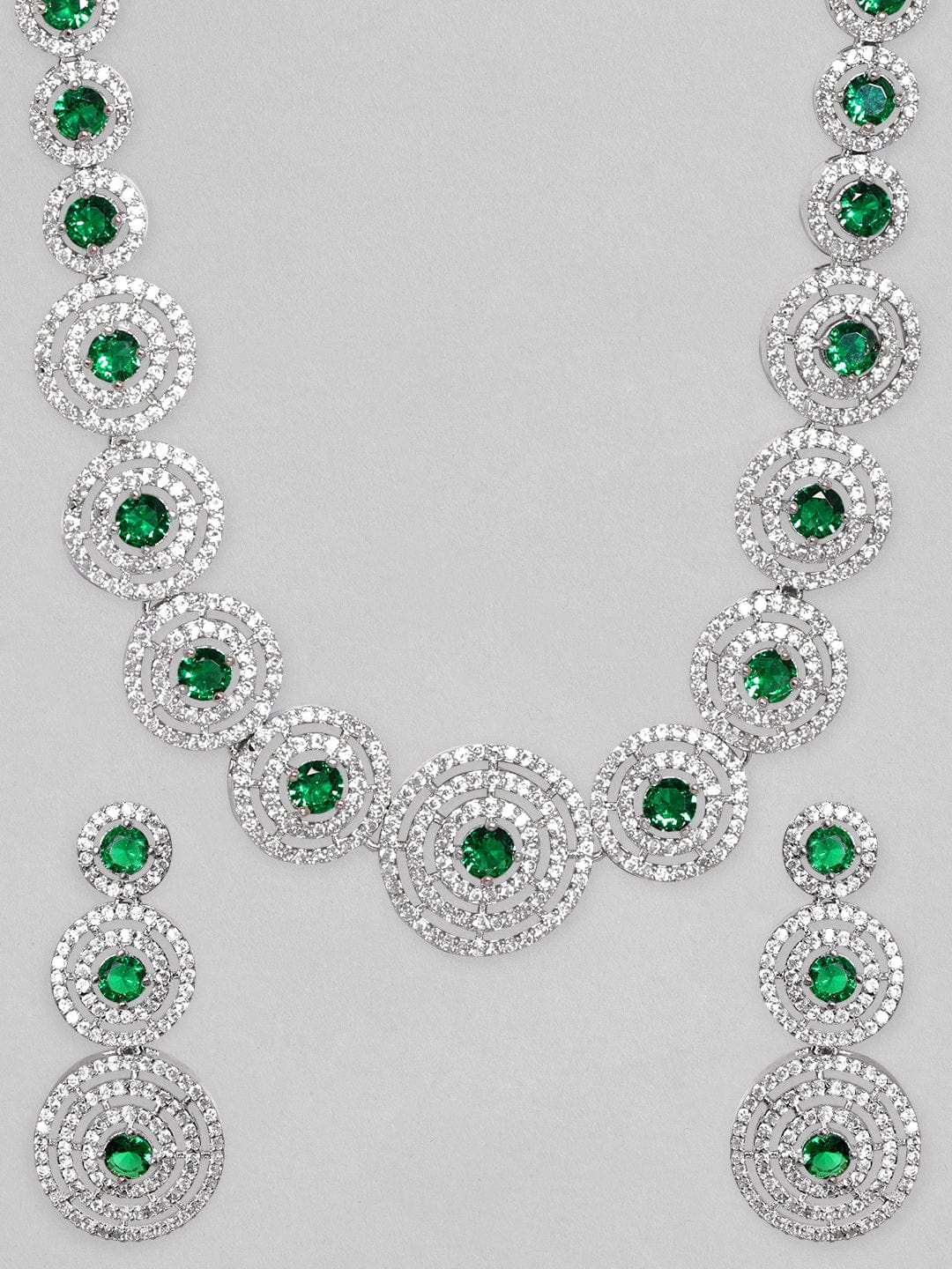 Wentra Rhodium Plated Emerald Green Zircons Studded Jewellery Set