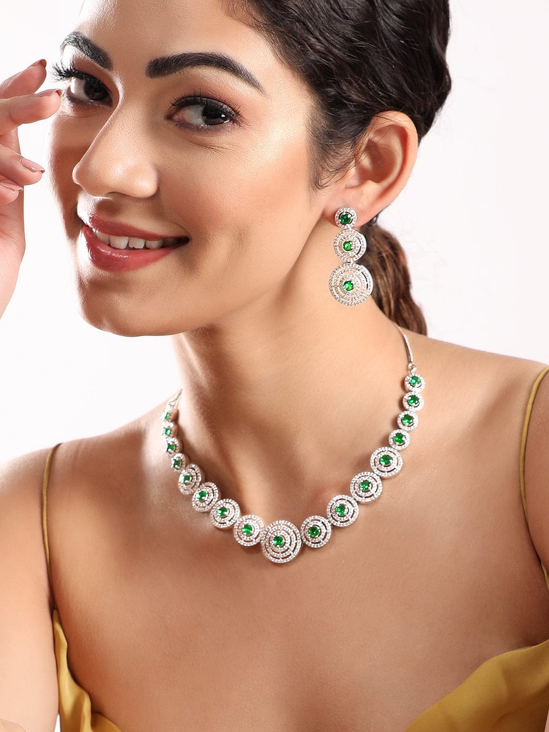 Wentra Rhodium Plated Emerald Green Zircons Studded Jewellery Set