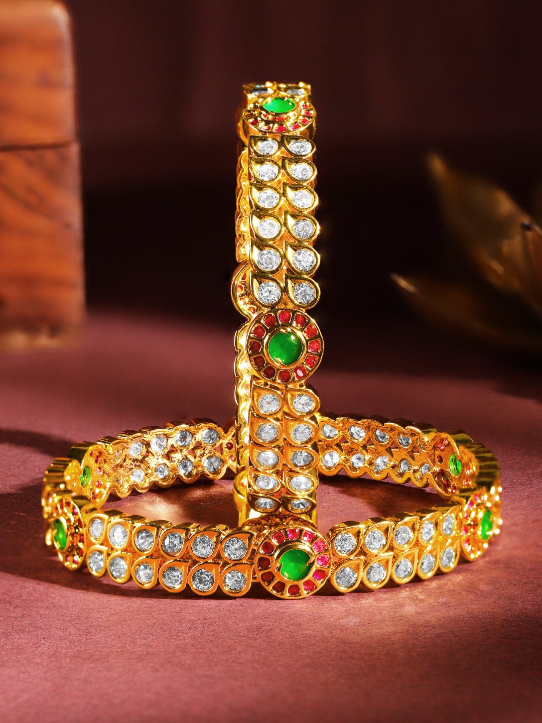 Wentra Set Of 2 24K Gold-Plated Ruby Pink & Emerald Green Kundan & White Cubic Zirconia Studded Handcrafted Bangles