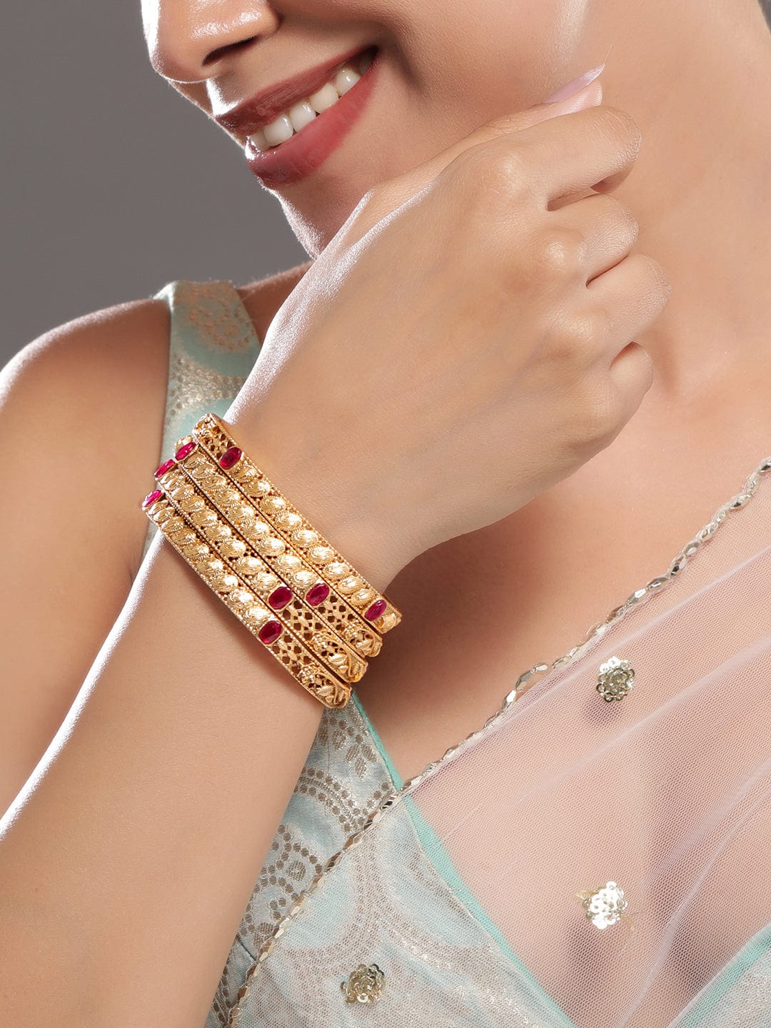 Wentra Set of 4, 22K Gold-Plated Ruby Pink Stone Studded Filigree Traditional Bangles