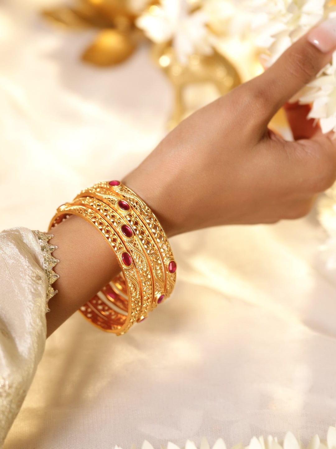 Wentra Set of 4 22K Gold-Plated Ruby Pink Stone Studded Traditional Motif Bangles