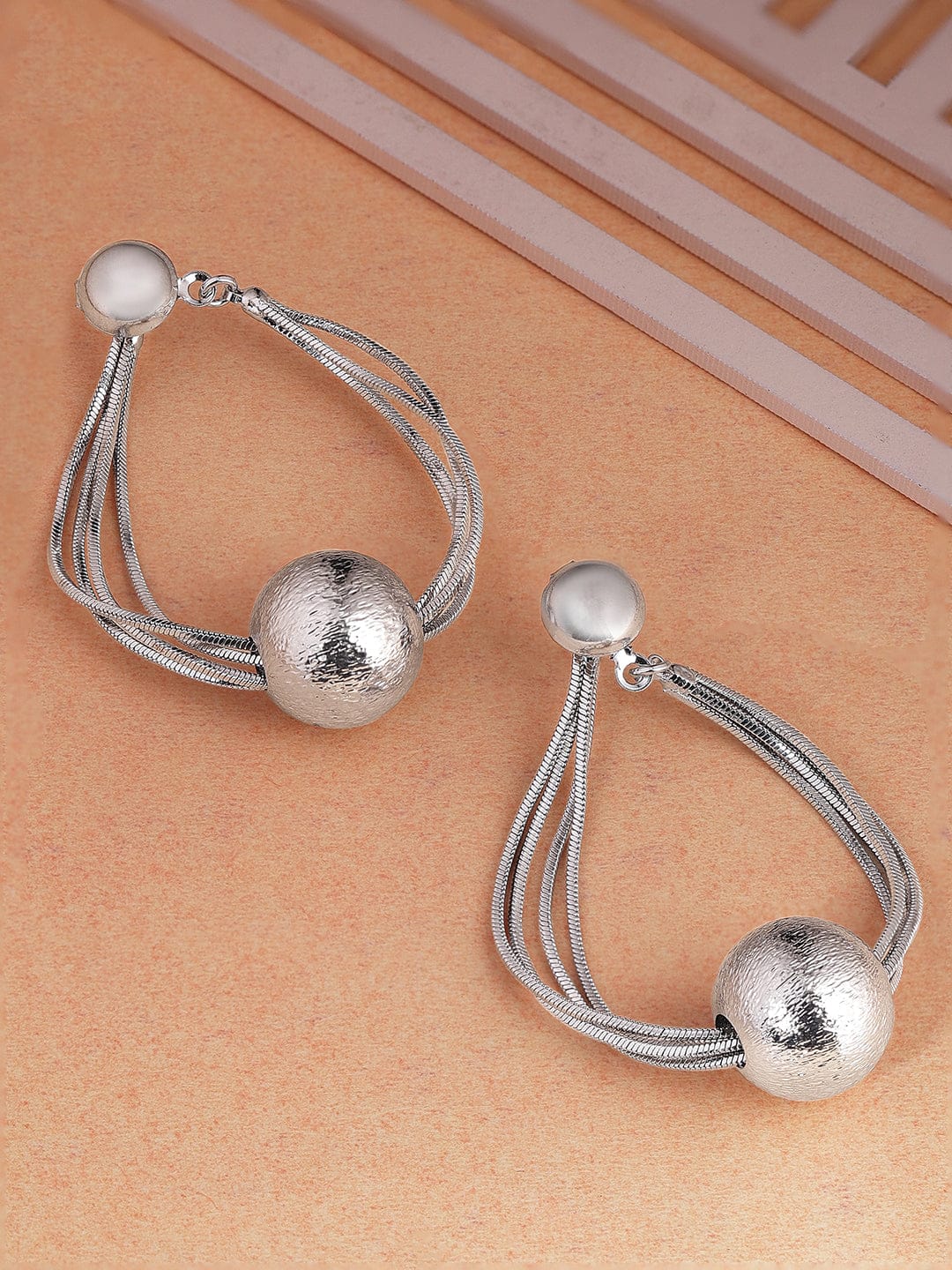 Dramatic Motion Silver Earrings