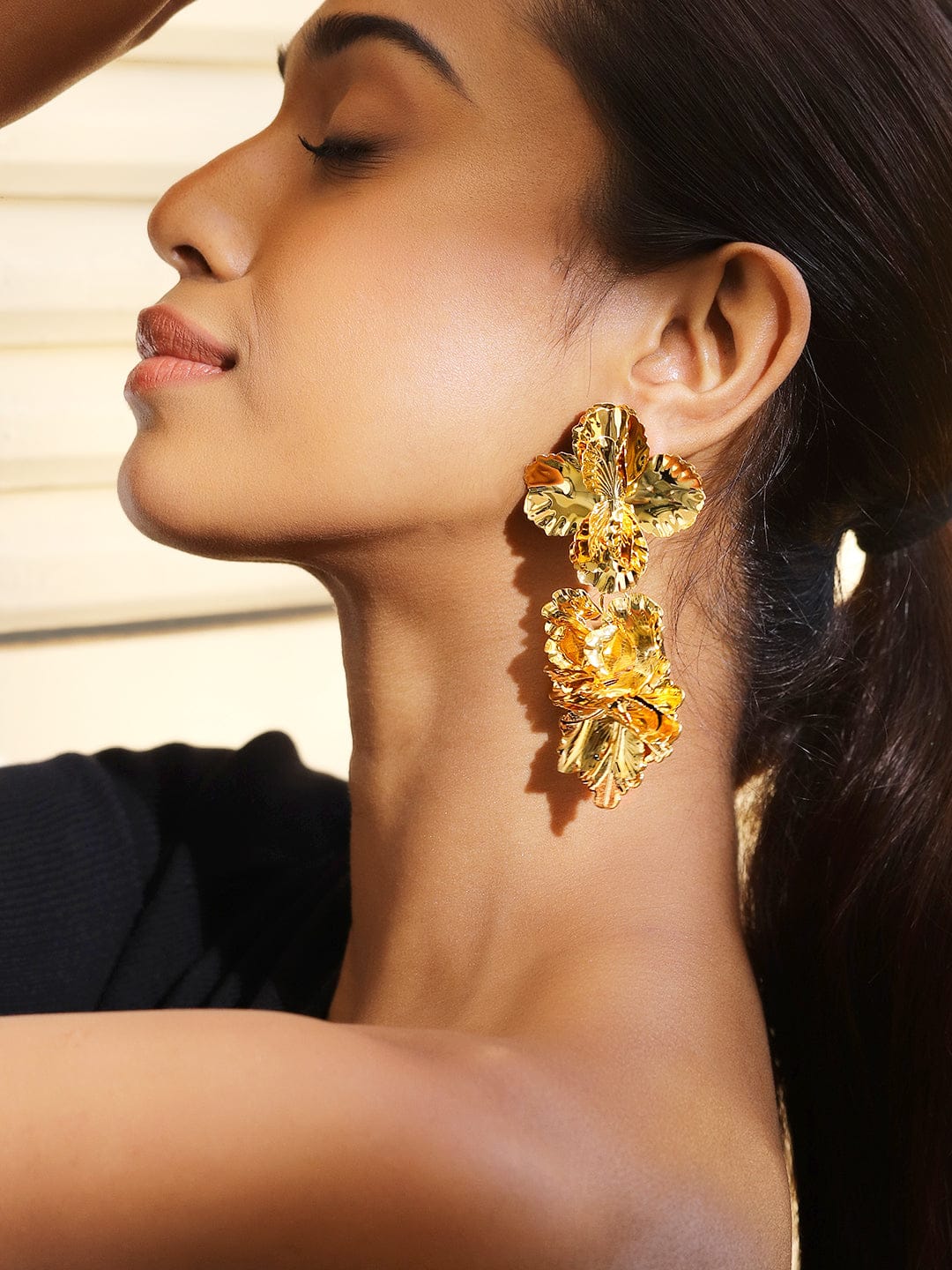 Gold Toned Leaf Motif Dangler Earrings