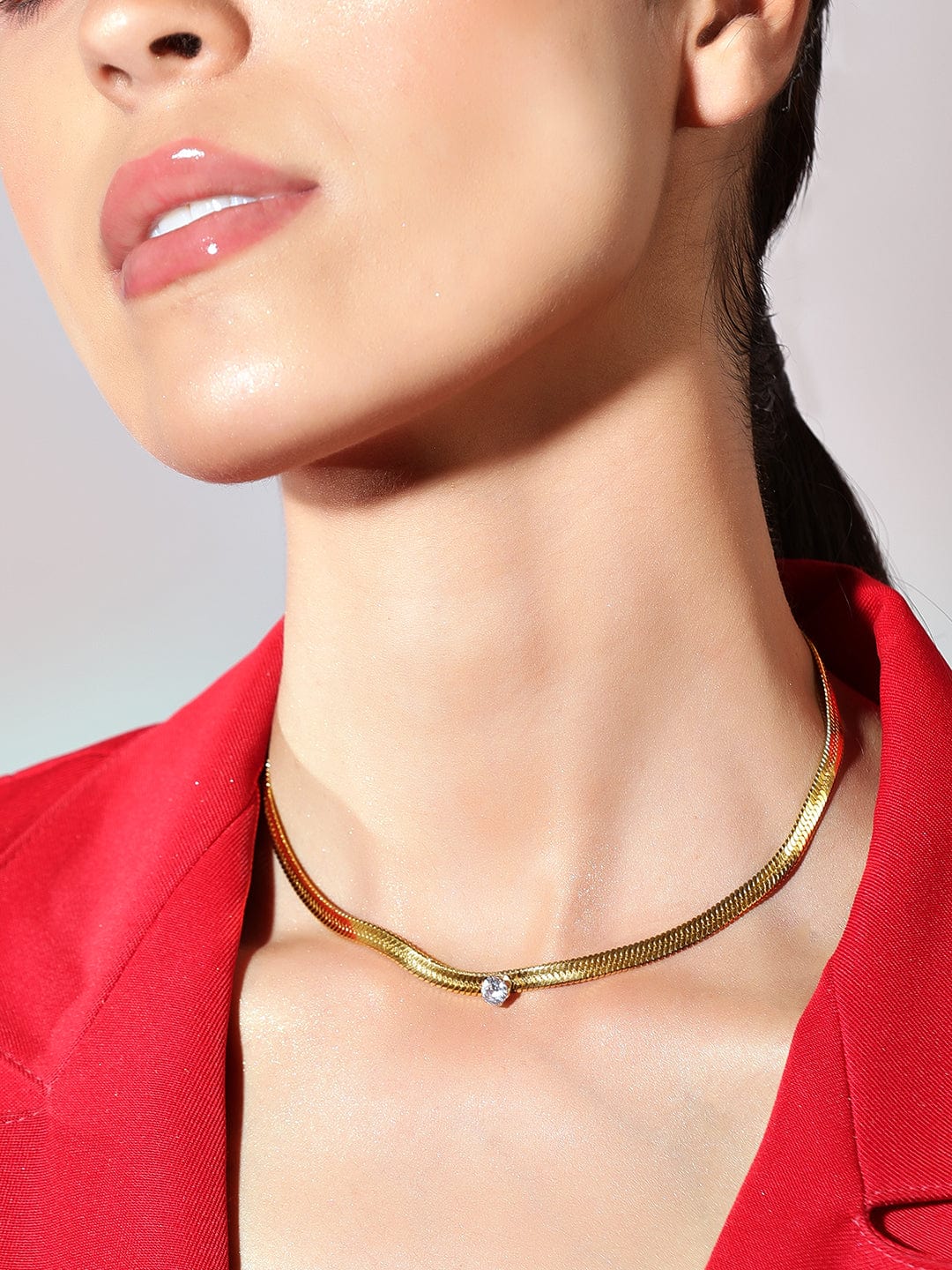 Wentra Voguish 18K Gold Plated Stainless Steel Waterproof Snake Chain With A Solitaire Zircon Studded Choker.