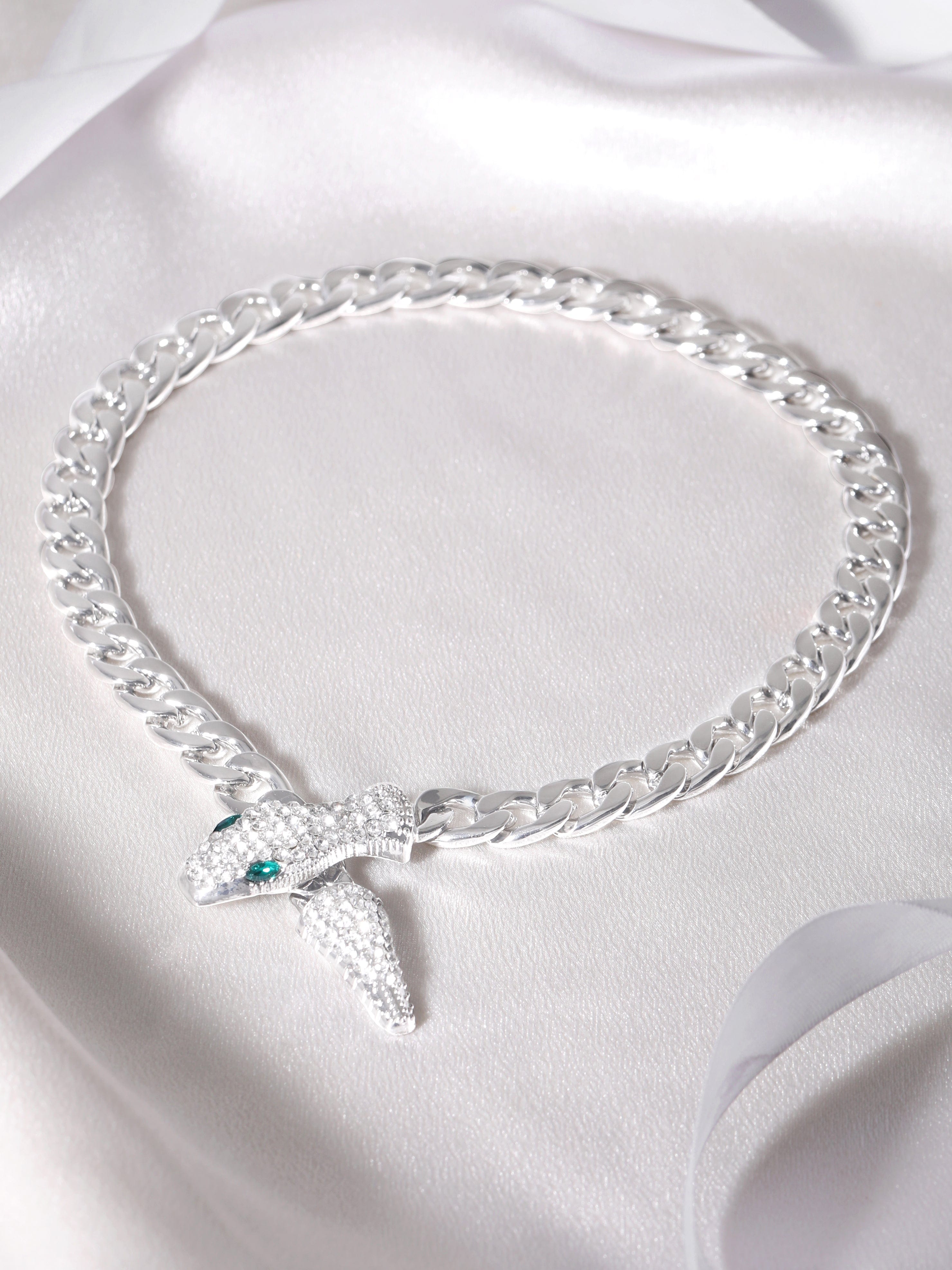 Wentra Voguish Silver Toned Link Style Serpent Chain With Zircon Stones Studded.